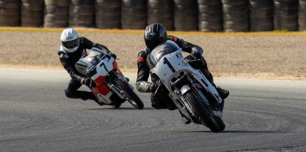 AHRMA racers Andrew Mauk (1) and Dave Roper (7). Photo by www.tmhill.com, courtesy of AHRMA.