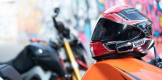 A helmet fitted with a Cardo Systems communications and entertainment system. Photo courtesy of MotoAmerica.