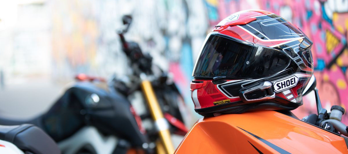 A helmet fitted with a Cardo Systems communications and entertainment system. Photo courtesy of MotoAmerica.