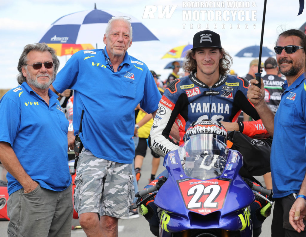 Ashton Yates (second from right) on the MotoAmerica Stock 1000 grid with grandfather Lucky Yates (far left), father Aaron Yates (far right), and VFR owner Vic Fasola (second from left) at Pittsburgh International Race Complex in 2019. Photo by Brian J. Nelson.