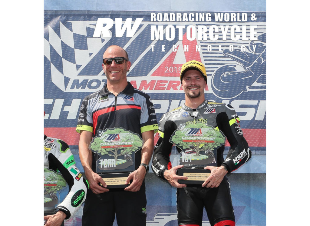 PJ Jacobsen (right) with his crew chief, former AMA Superbike racer Scotty Jensen (left) on top of the MotoAmerica Supersport podium after winning at VIR in 2019. Photo by Brian J. Nelson.