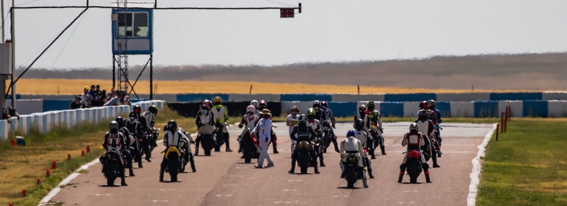Motorcycle road racers on the grid at High Plains Raceway (HPR). Photo by Jim Browning, courtesy of HPR.