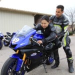 Yamaha Champions Riding School instructor and Army of Darkness rider Chris Peris teaching Hiyori Yoshida proper sportbike riding body positioning.