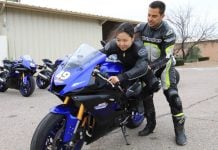 Yamaha Champions Riding School instructor and Army of Darkness rider Chris Peris teaching Hiyori Yoshida proper sportbike riding body positioning.