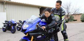 Yamaha Champions Riding School instructor and Army of Darkness rider Chris Peris teaching Hiyori Yoshida proper sportbike riding body positioning.
