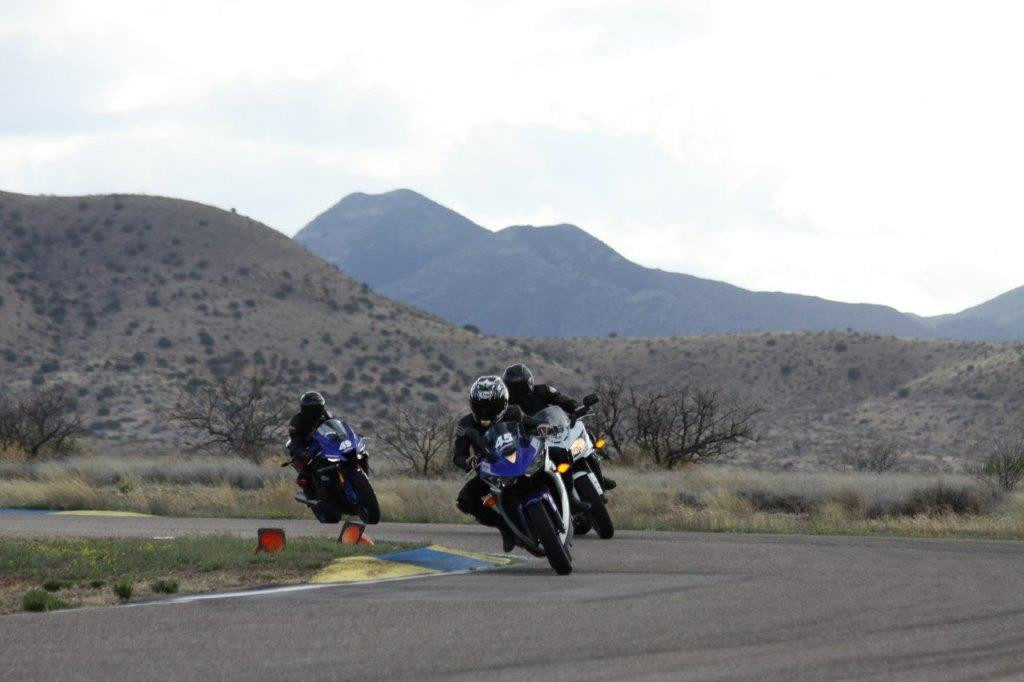 Hiyori Yoshida (45) on track with adoptive parents Sam Fleming and Melissa Berkoff during a Yamaha Champions Riding School at Inde Motorsports Park, in Arizona.