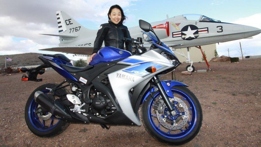 Engineering student and motorcycle enthusiast Hiyori Yoshida with a Yamaha Champions Riding School YZF-R3 at Inde Motorsports Ranch, in Arizona.