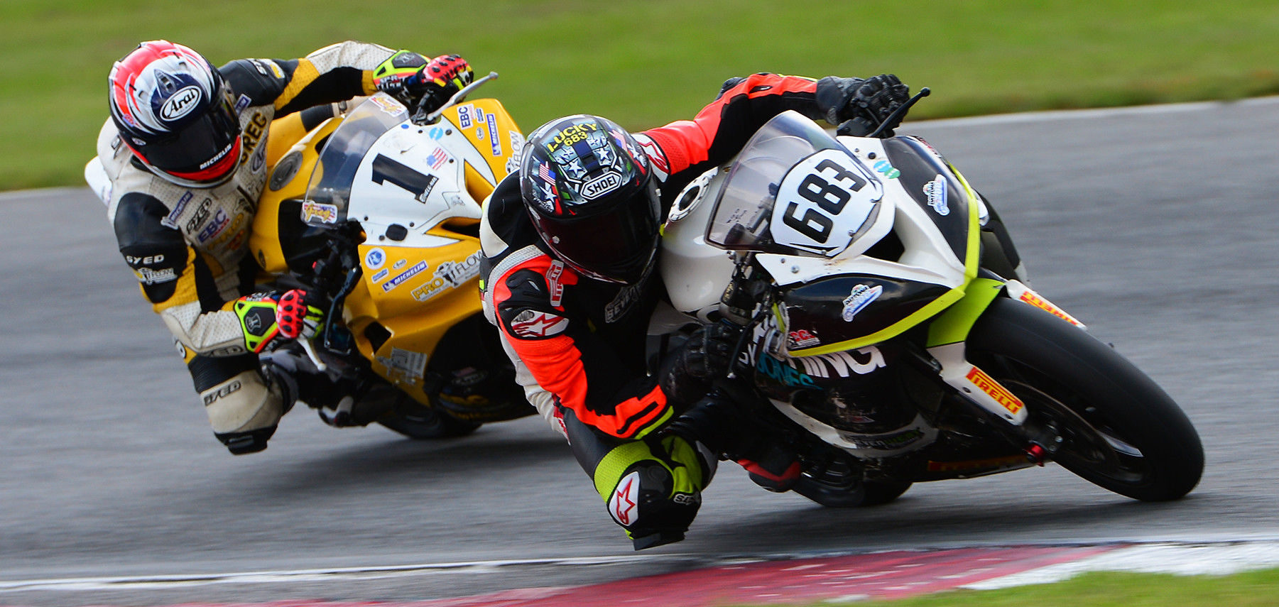 ASRA/CCS racers Ryan Jones (683) and Greg Melka (1) at speed during an event at Roebling Road Raceway in 2019. Photo by Lisa Theobald, courtesy of ASRA/CCS.