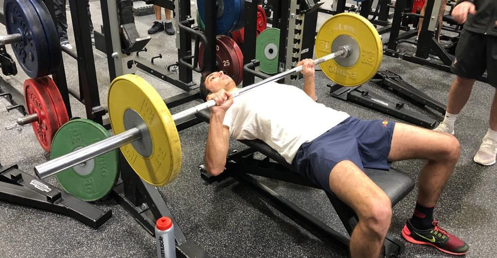 Toprak Razgatliuglu bench pressing weights during a fitness test at Loughborough Sport at Loughborough University in the UK. Photo courtesy of Yamaha.