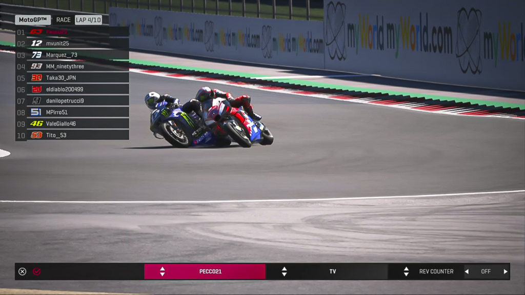 Maverick Vinales (12) goes inside of Francesco Bagnaia (63) during MotoGP Virtual Race Two at Red Bull Ring. Image courtesy of Dorna/www.motogp.com.