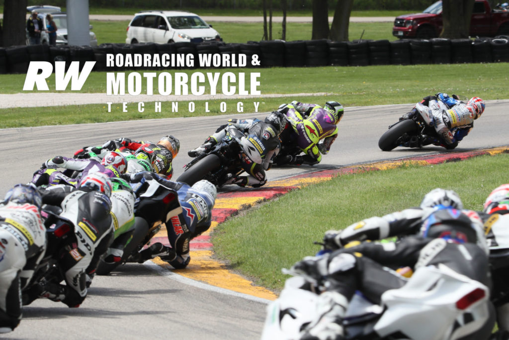 With race leader Bobby Fong already out of frame to the right, Sean Dylan Kelly heads Hayden Gillim, Josh Hayes, PJ Jacobsen, Richie Escalante, and the rest of the field during MotoAmerica Supersport Race Two at Road America in 2019. Photo by Brian J. Nelson.