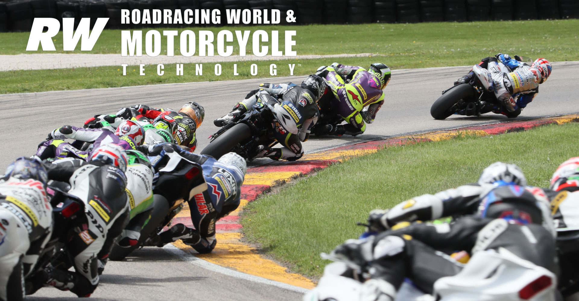 With race leader Bobby Fong already out of frame to the right, Sean Dylan Kelly heads Hayden Gillim, Josh Hayes, PJ Jacobsen, Richie Escalante, and the rest of the field during MotoAmerica Supersport Race Two at Road America in 2019. Photo by Brian J. Nelson.