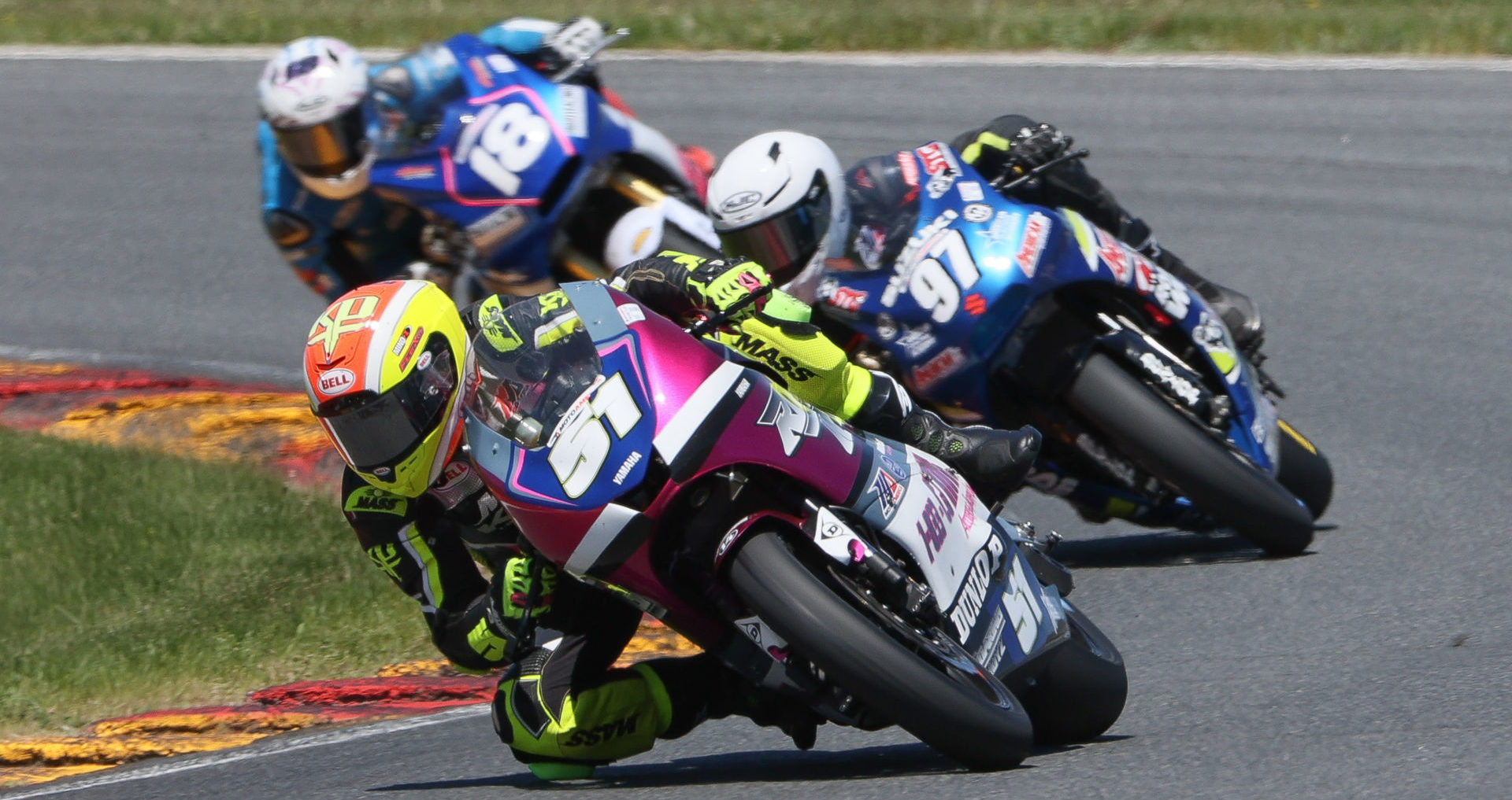 Kaleb De Keyrel (51), Rocco Landers (97), and Jackson Blackmon (18) race for the lead in MotoAmerica Twins Cup Race Two at Road America. Photo by Brian J. Nelson, courtesy MotoAmerica.