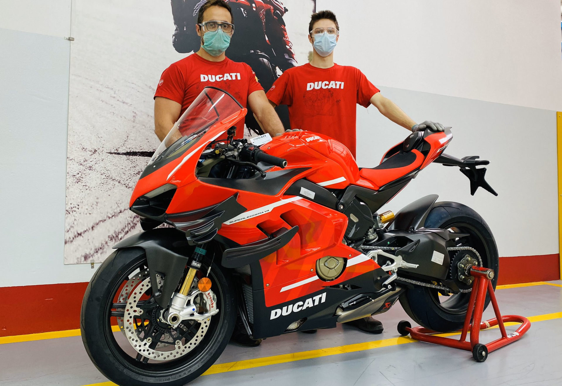 Workers with a pre-production Ducati Superleggera V4 at Ducati's factory in Italy. Photo courtesy Ducati.