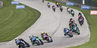 Rocco Landers (97) leads Toby Khamsouk (27), Kaleb De Keyrel (51) and the rest of the field early in MotoAmerica Twins Cup Race One. Photo by Brian J. Nelson, courtesy MotoAmerica.