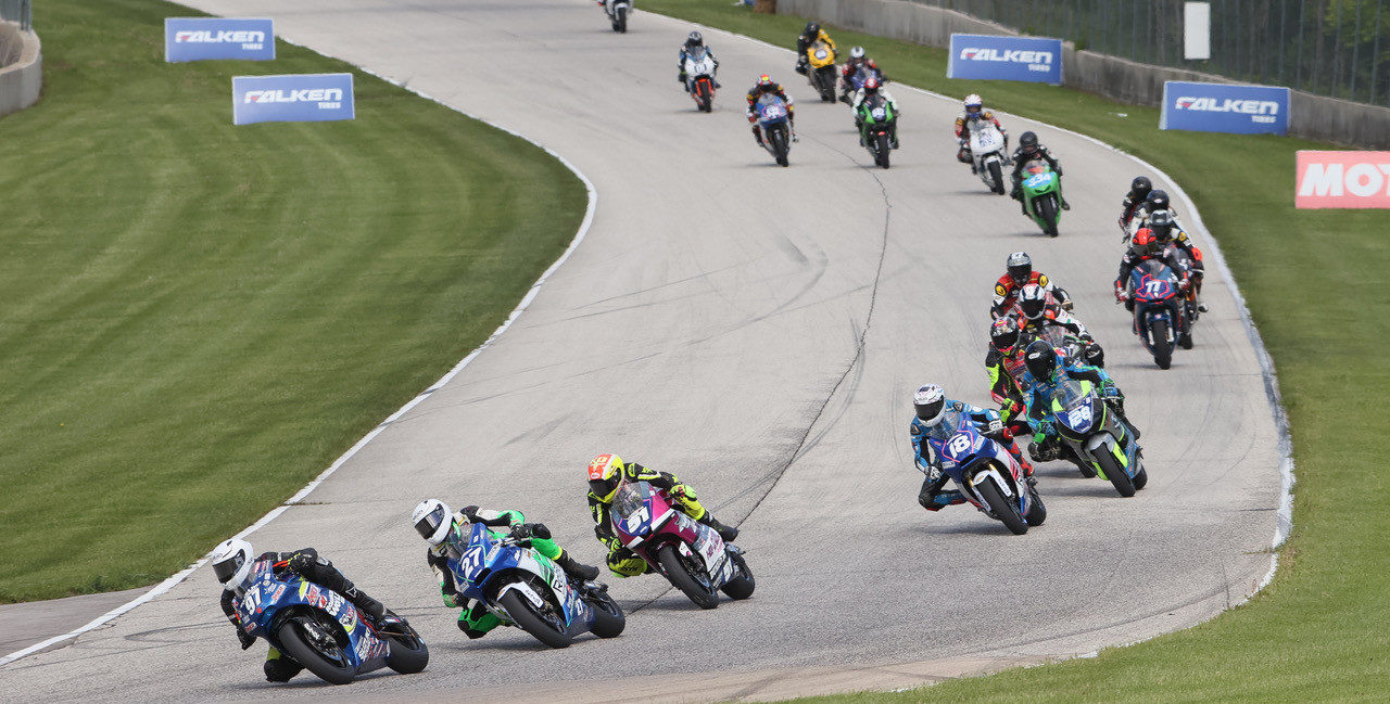 Rocco Landers (97) leads Toby Khamsouk (27), Kaleb De Keyrel (51) and the rest of the field early in MotoAmerica Twins Cup Race One. Photo by Brian J. Nelson, courtesy MotoAmerica.