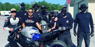 Army Of Darkness (from left): Ben Walters, Chris Manfrin, Chris Peris, Tim Gooding, Sam Fleming, Melissa Berkoff, YT Lechner, Anthony Consorte (behind Lechner), and Bobby Jones. Photo courtesy N2 Racing.