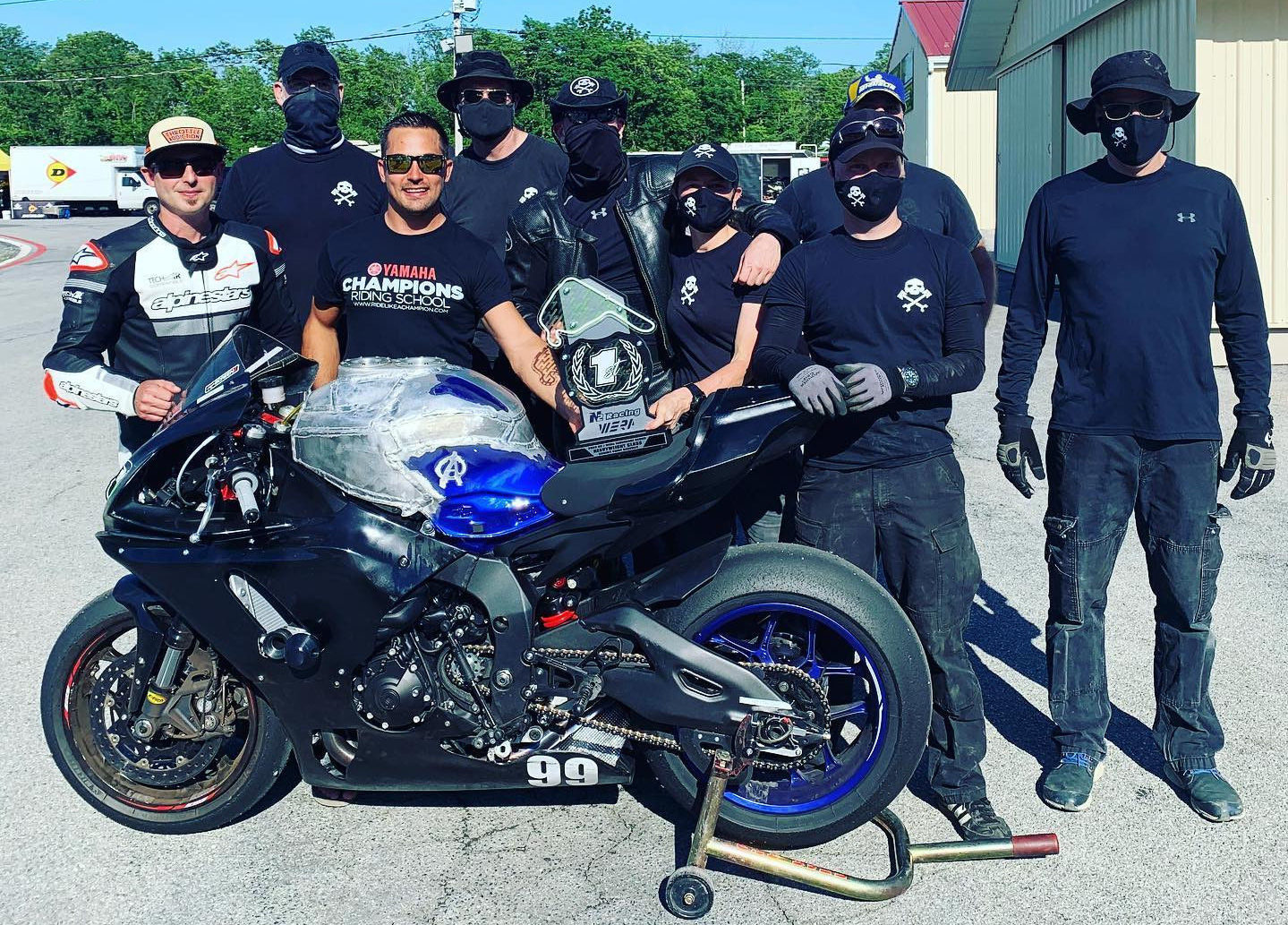 Army Of Darkness (from left): Ben Walters, Chris Manfrin, Chris Peris, Tim Gooding, Sam Fleming, Melissa Berkoff, YT Lechner, Anthony Consorte (behind Lechner), and Bobby Jones. Photo courtesy N2 Racing.