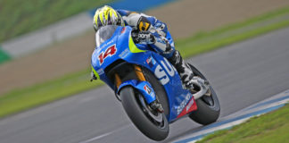 Suzuki test rider Nobuatsu Aoki riding a Suzuki GSX-RR wearing Randy De Puniet’s #14. Photo courtesy of Team Suzuki Press Office.