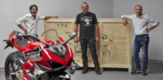 Ducati VP Global Sales and After Sales Francesco Milicia (left) and Ducati CEO Claudio Domenicali (right) deliver Superleggera V4 #001 to Ducatista Filip Van Schil (center) at the Ducati factory in Italy. Photo courtesy Ducati.