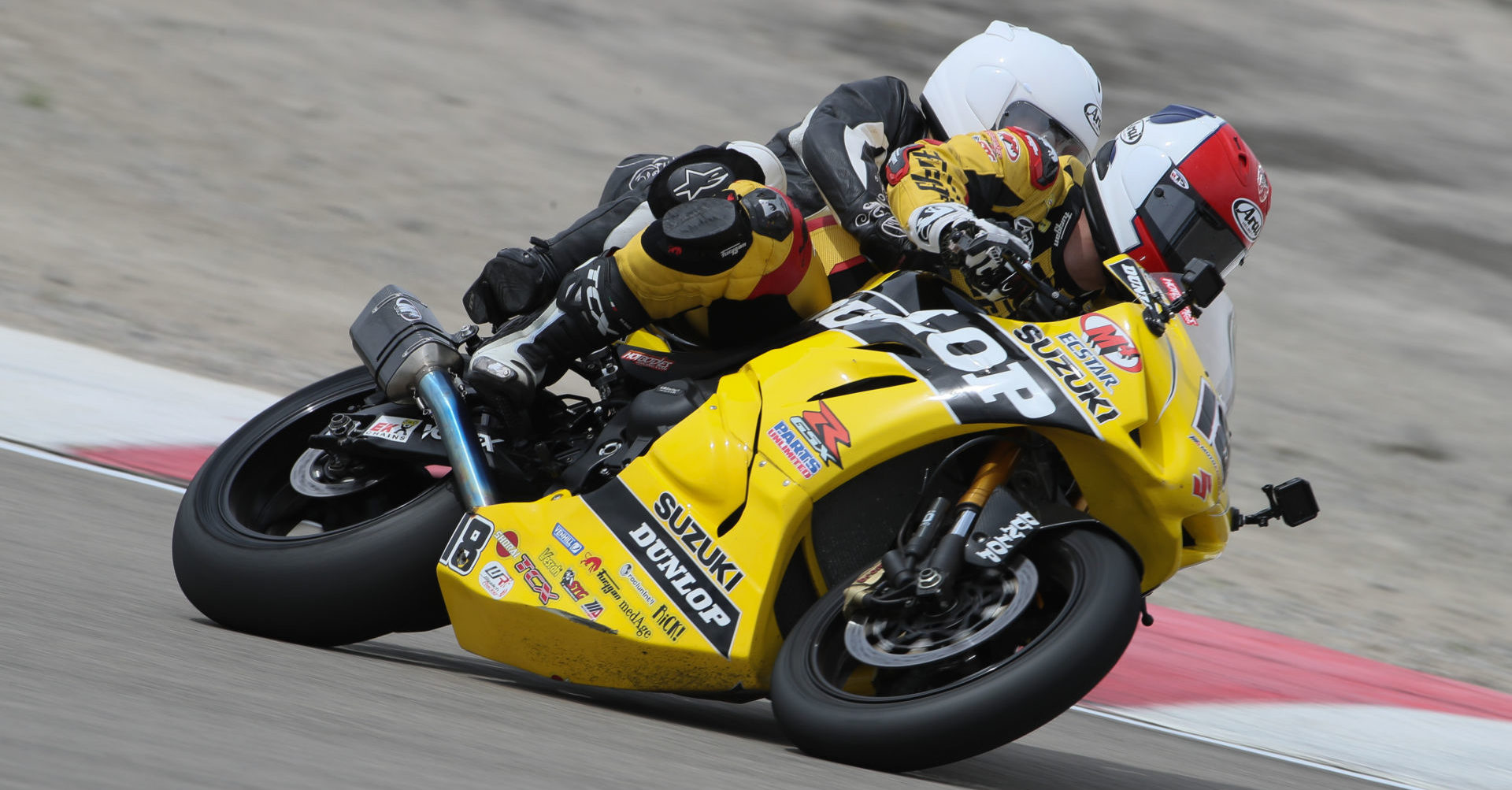 Chris Ulrich pilots the Dunlop M4 Suzuki Two-seat Superbike. Team Hammer has been operating the program for 20 years. Photo by Brian J Nelson.