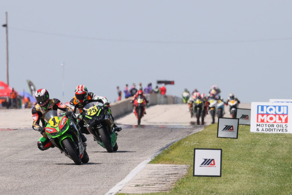 Rocco Landers (1) leads Dominic Doyle (25) and the rest of the field during MotoAmerica Liqui Moly Junior Cup Race 2 at Road America. Photo by Brian J. Nelson, courtesy MotoAmerica.