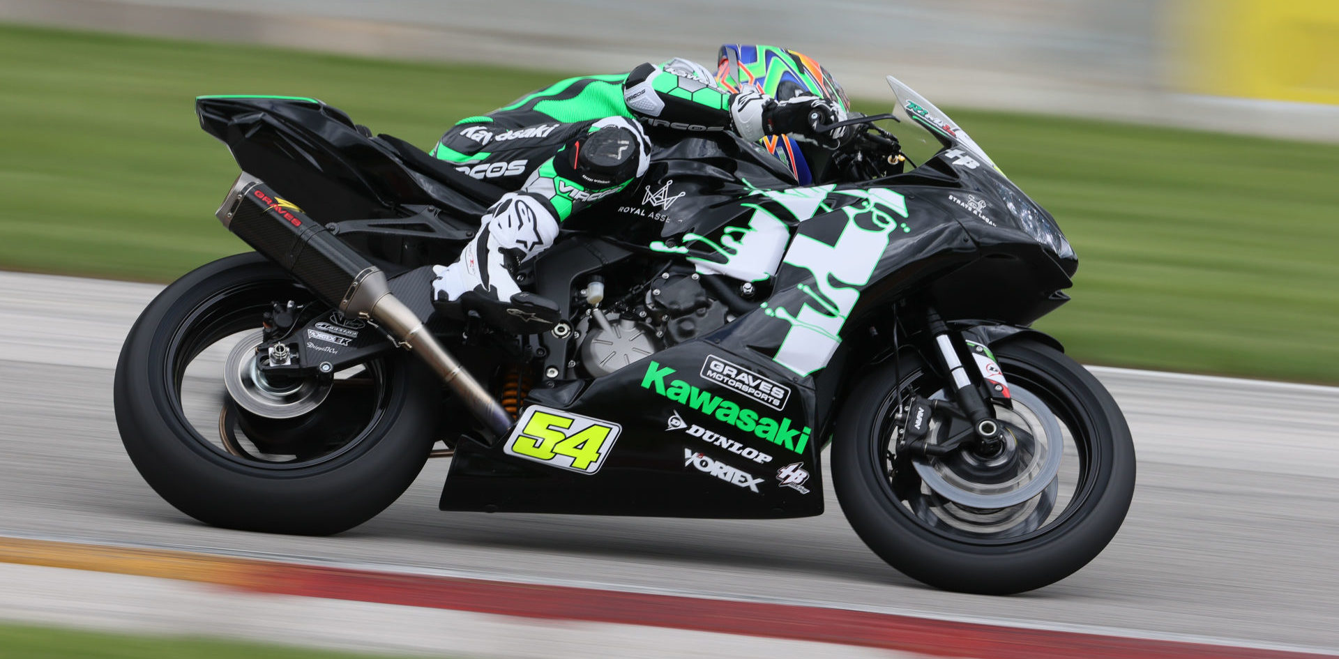 Richie Escalante (54) at speed on his HONOS Kawasaki 636cc ZX-6R at Road America. Photo by Brian J. Nelson, courtesy HONOS.