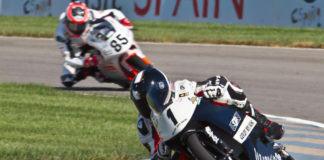 Garrett Gerloff (1) leads Jake Lewis (85) during a USGPRU Moriwaki MD250H Powered by Honda race at Indianapolis Motor Speedway in 2010.