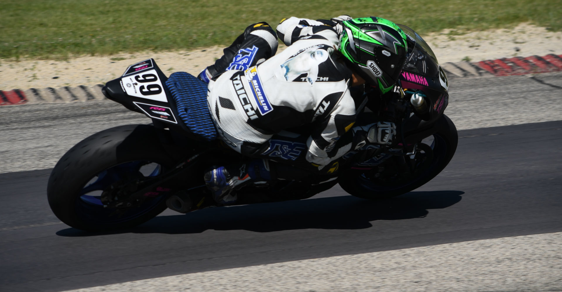 Nate Minster (99) in action during an ASRA/CCS event at Blackhawk Farms Raceway. Photo by H&E Services, courtesy TSE Racing.