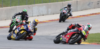 PJ Jacobsen (99), riding a Ducati Panigale V4 R, leads Cameron Petersen (45), Corey Alexander (23), and Stefano Mesa (37) during the MotoAmerica Stock 1000 race at Road America. Photo by Brian J. Nelson, courtesy MotoAmerica.