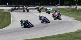 Cameron Beaubier (1) leads Bobby Fong (50), Kyle Wyman (33), Toni Elias (24), Jake Gagne (32), Josh Herrin (2), Mathew Scholtz (11), and the rest of the field early in MotoAmerica Superbike One. Photo by Brian J. Nelson, courtesy MotoAmerica.