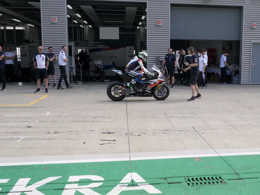 Eugene Laverty (50) returns from a run on his BMW S 1000 RR World Superbike at Lausitzring, in Germany. Photo courtesy BMW Motorrad WorldSBK Team.