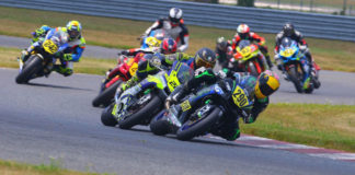 Justine Miraglia (290) leading the MotoGirlGT Superbike race and making her way through the Heavyweight Supersport Amateur field at New Jersey Motorsports Park. Photo by etechphoto.com, courtesy MotoGirlGT.