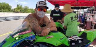 Jordan Szoke (left) in the pits with his Kawasaki ZX-10R at Calabogie Motorsports Park. Photo by Colin Fraser, courtesy CSBK/PMP.