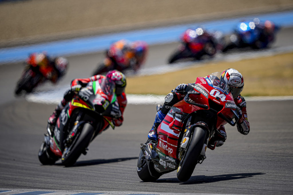 Andrea Dovizioso (04) leading Aleix Espargaro (41). Photo courtesy Ducati.