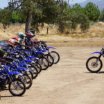 Rich Oliver (right) instructing at a Kids Ride and Wrench Camp at the Mystery School. Photo courtesy Rich Oliver's Mystery School.