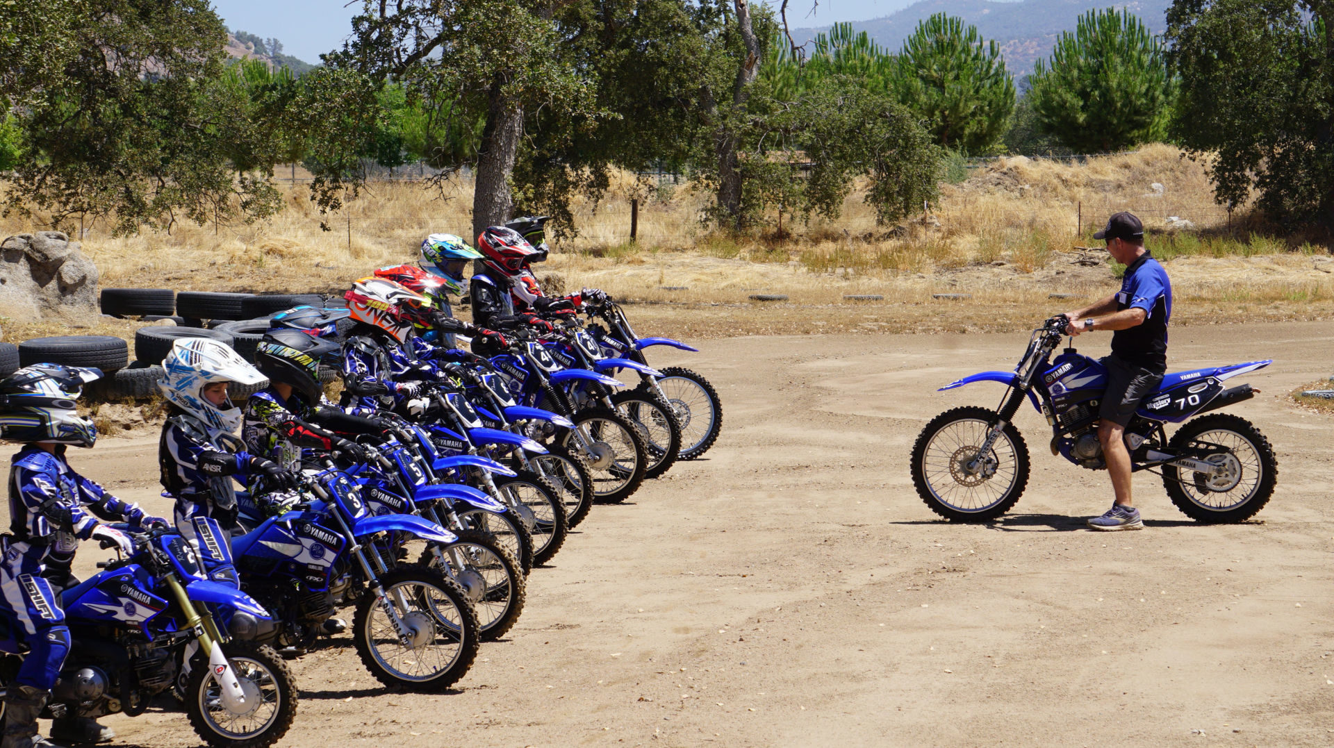Rich Oliver (right) instructing at a Kids Ride and Wrench Camp at the Mystery School. Photo courtesy Rich Oliver's Mystery School.