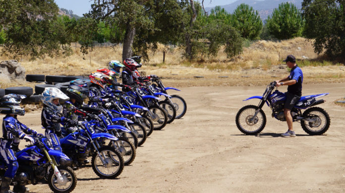 Rich Oliver (right) instructing at a Kids Ride and Wrench Camp at the Mystery School. Photo courtesy Rich Oliver's Mystery School.