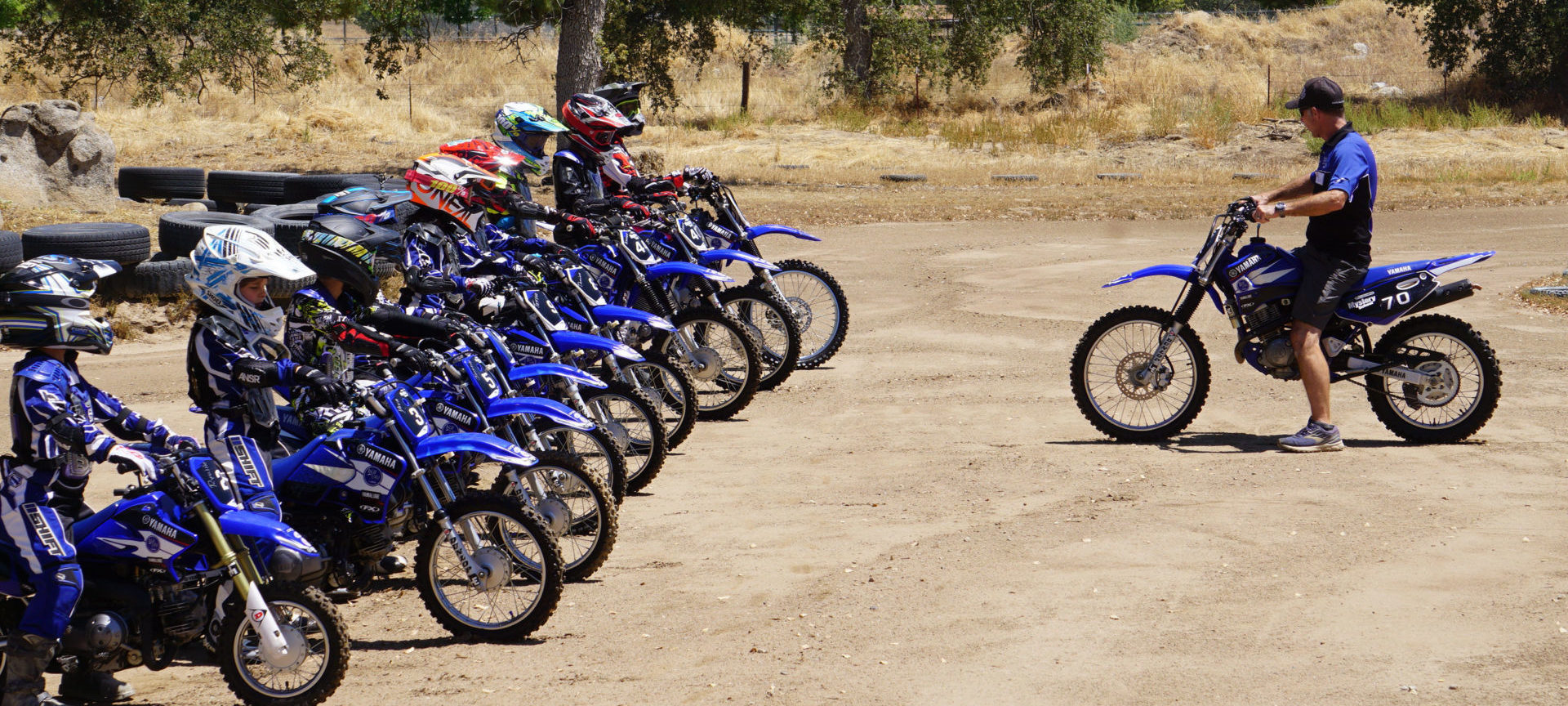 Rich Oliver (right) instructing at a Kids Ride and Wrench Camp at the Mystery School. Photo courtesy Rich Oliver's Mystery School.