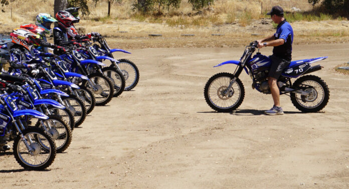 Rich Oliver (right) instructing at a Kids Ride and Wrench Camp at the Mystery School. Photo courtesy Rich Oliver's Mystery School.