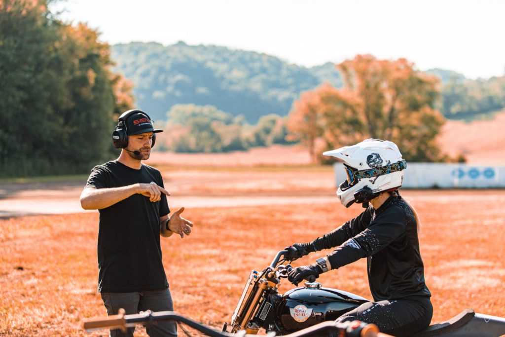 Johnny Lewis (left) working with Melissa Paris (right). Photo courtesy Royal Enfield North America.