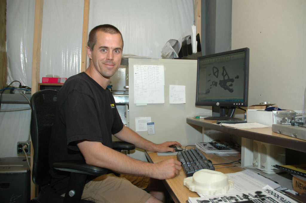 Eric Wood at his desk at Woodcraft, circa 2010. Photo by David Swarts.