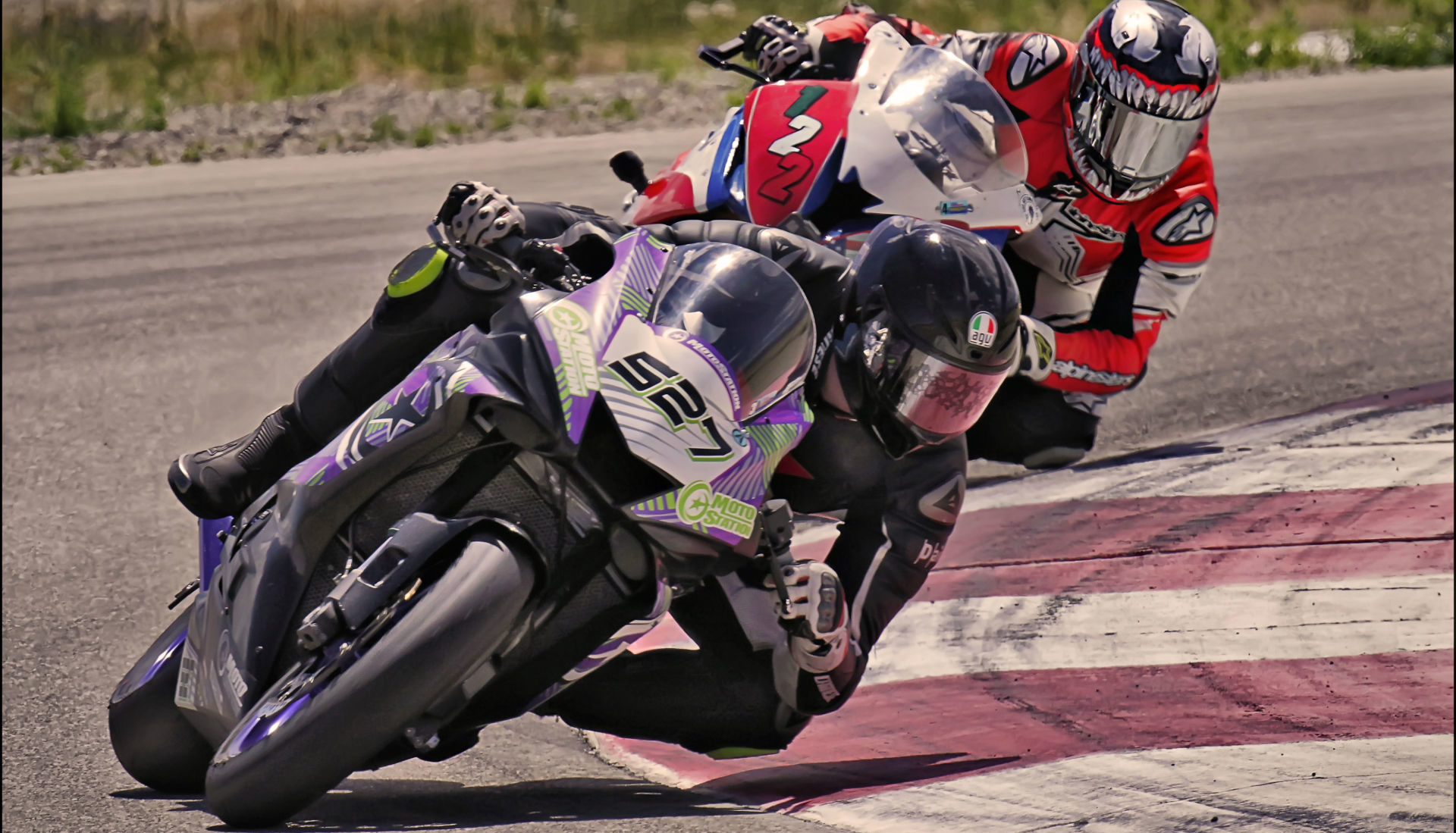 Jerry Hicks (527) fends off Genaro Lopez (122) into Turn 10 at Round 4 of UtahSBA’s Utah Motorcycle Law Masters of the Mountains Race Series July 25th at Utah Motorsports Campus. Photo by Steve Midgley, courtesy UtahSBA.