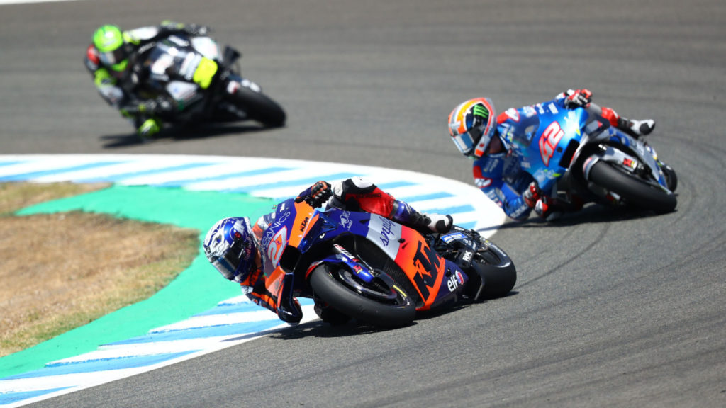 Iker Lecuona (27) leading Alex Rins (42) and Cal Crutchlow (35). Photo courtesy Red Bull KTM Tech3.