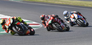 Lorenzo Savadori (32), Michele Pirro (51), and Andrea Mantovani (9) battle during an Elf CIV (Italian) Championship race at Mugello. Photo courtesy Elf CIV Press Office.