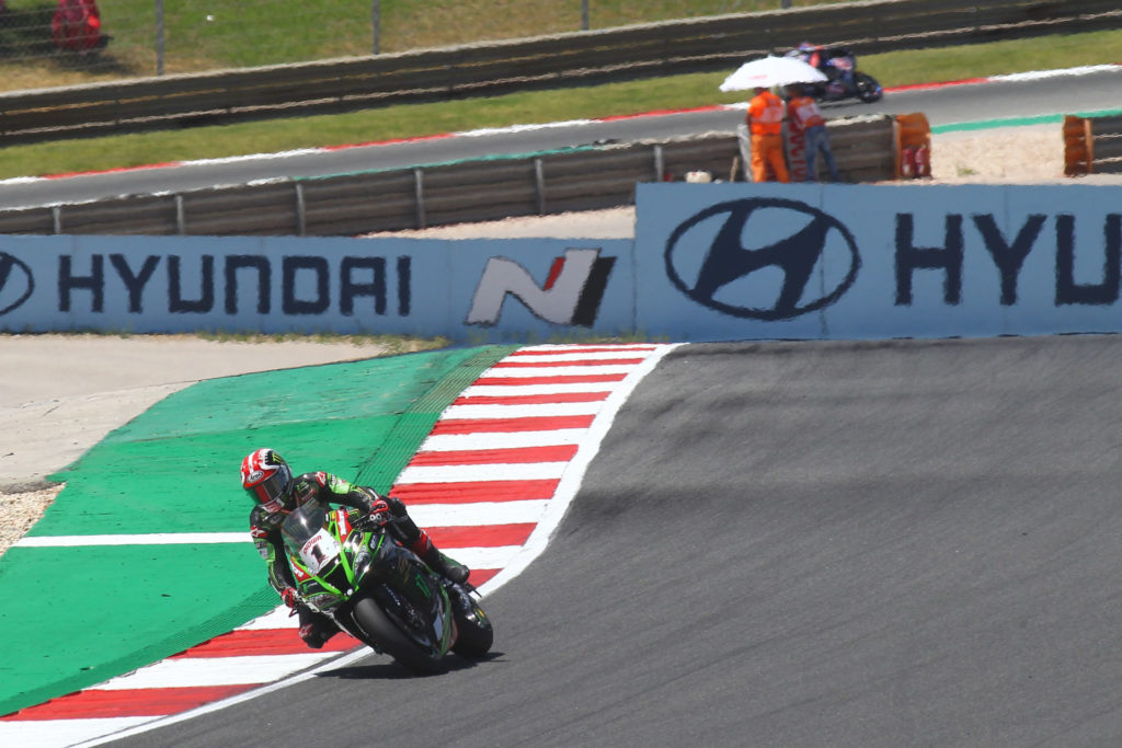 Jonathan Rea (1) leading World Superbike Race Two. Photo courtesy Dorna.