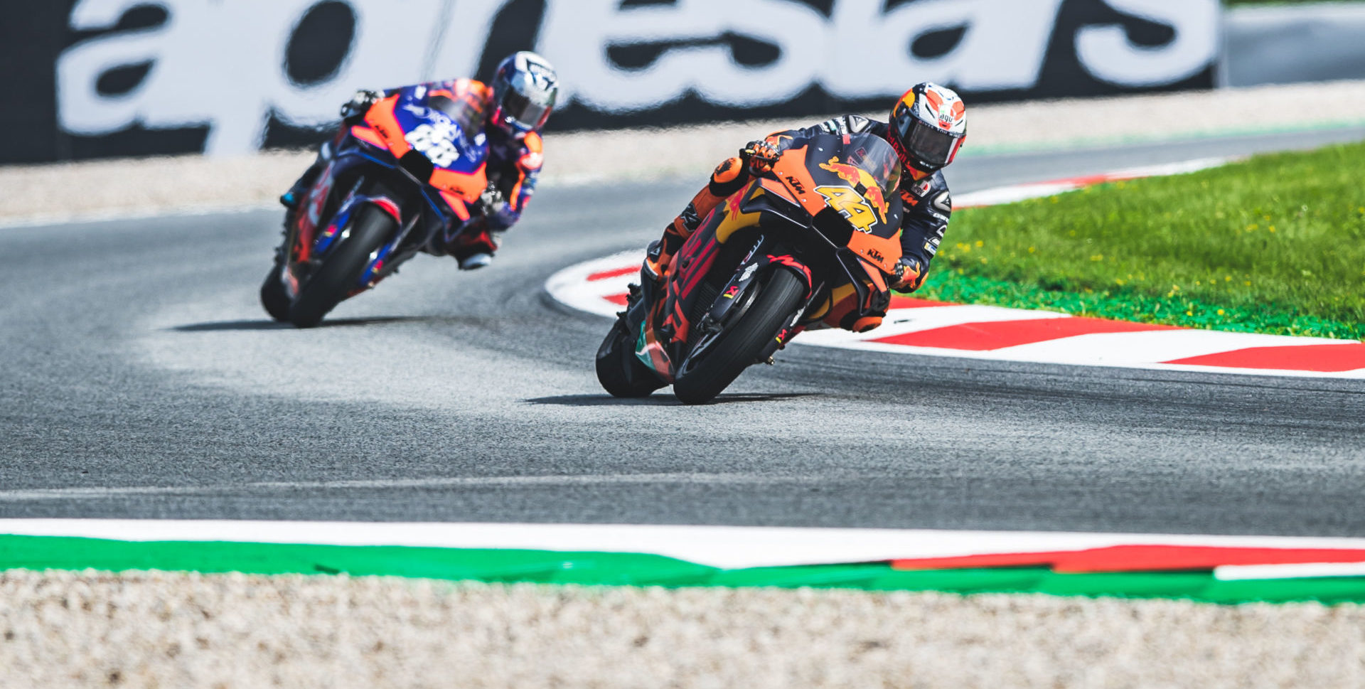 Pol Espargaro (44) and Miguel Oliveira (88) made contact and crashed during the MotoGP race in Austria. Photo by Polarity Photo, courtesy KTM.