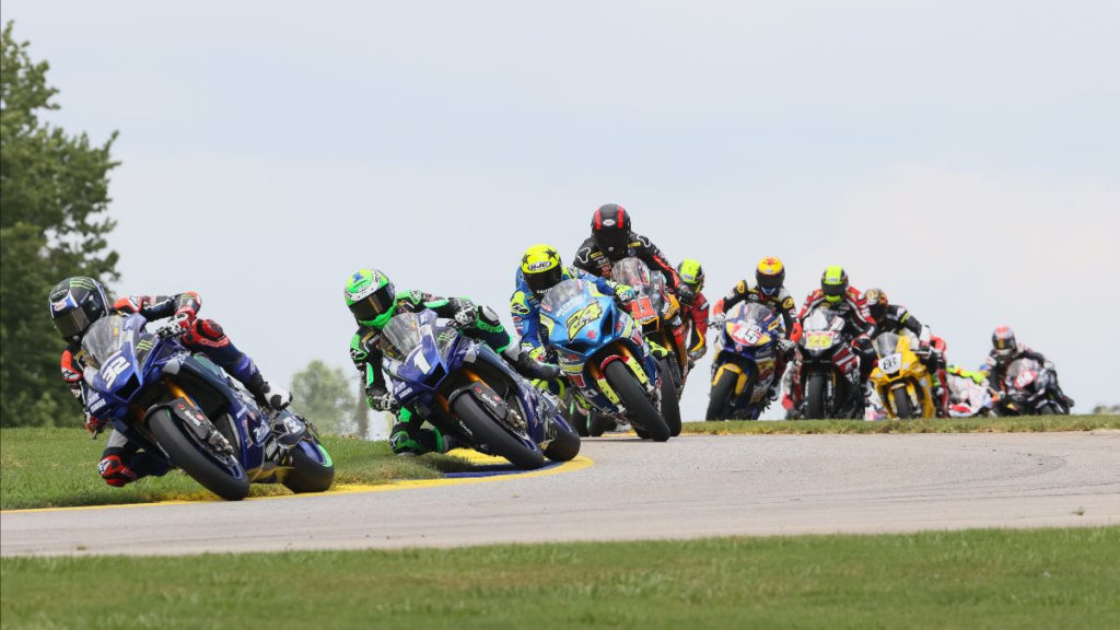 Jake Gagne (32) leads Cameron Beaubier (1), Toni Elias (24), Mathew Scholtz (11) and the rest of the MotoAmerica Superbike field early in Race One at Road Atlanta. Photo by Brian J. Nelson, courtesy MotoAmerica.