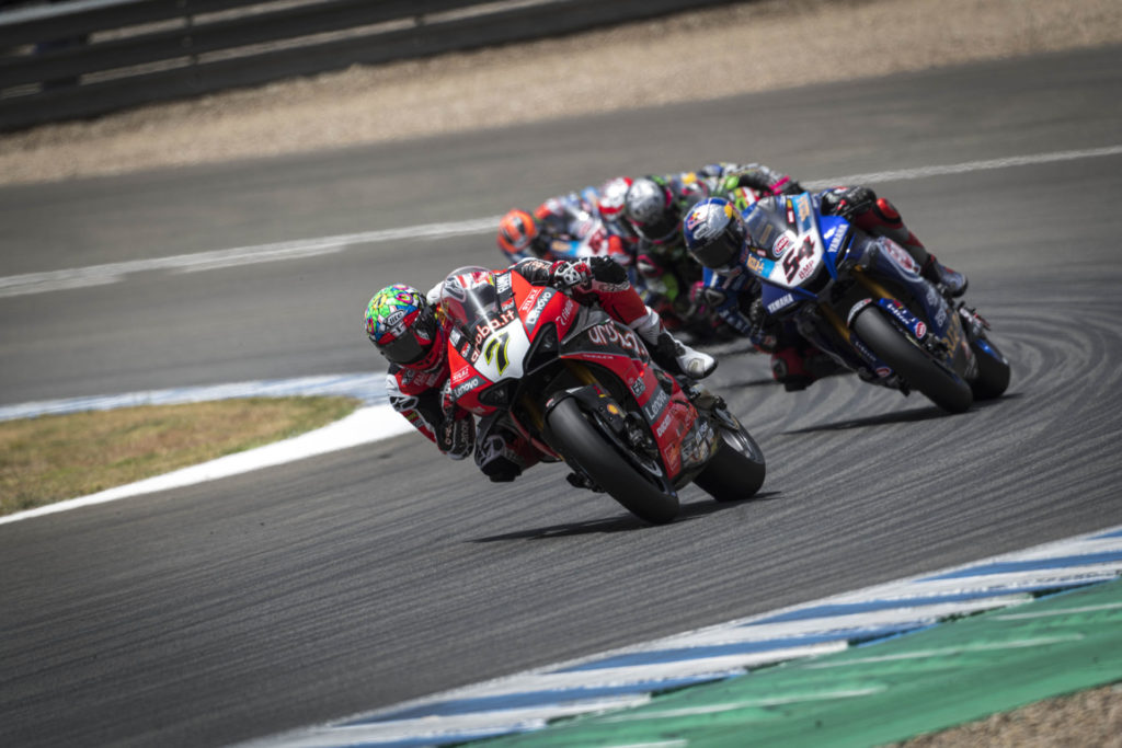 Chaz Davies (7) leading Toprak Razgatlioglu (54) and a group of riders at Jerez. Photo courtesy Ducati.