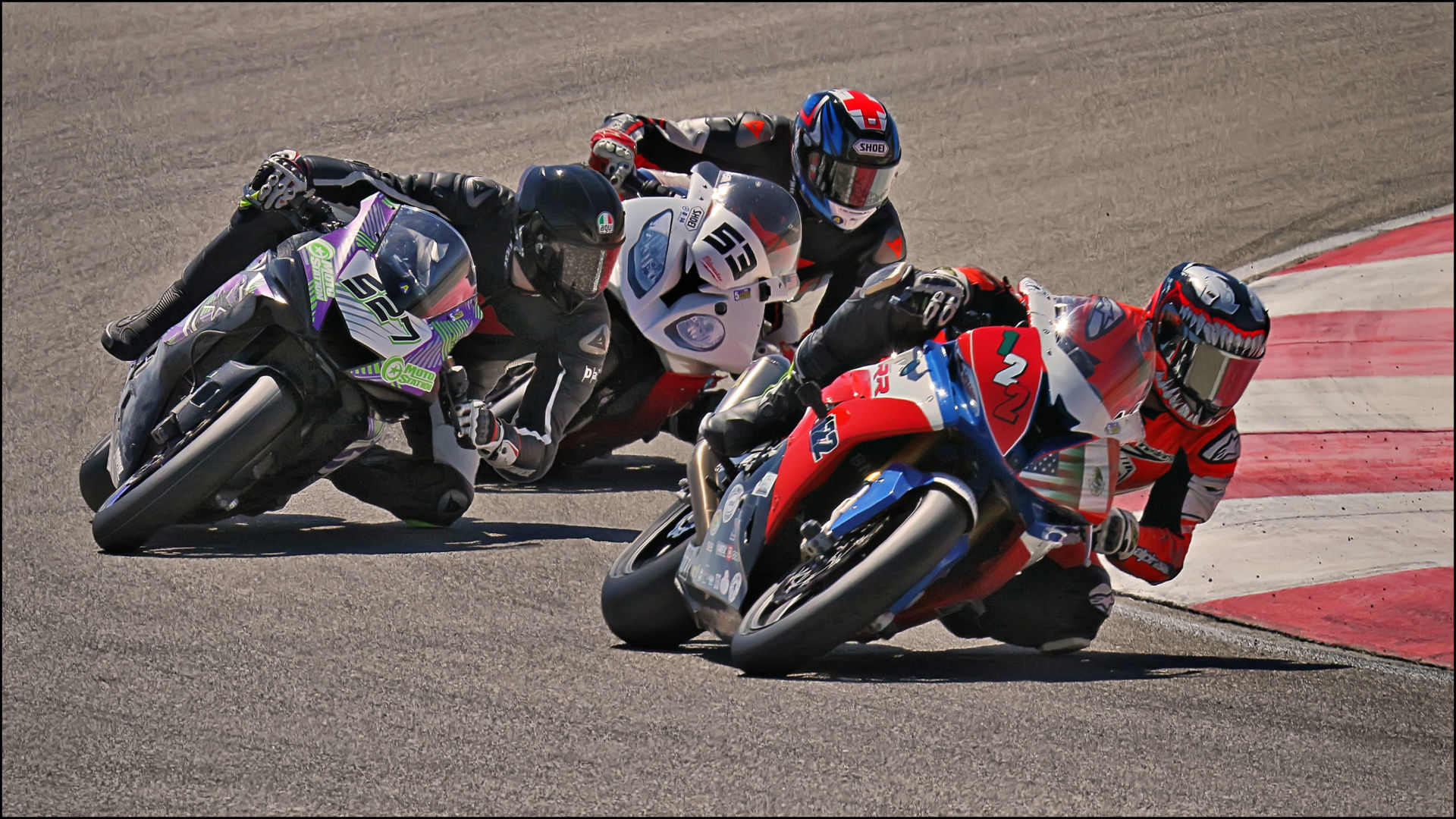 Genaro Lopez (122) leads Jerry Hicks (527) and Bill Davis (53) in the hotly contested King of the Mountain GTO race during Round 5 of UtahSBA’s Utah Motorcycle Law Masters of the Mountains Race Series August 15 at Utah Motorsports Campus’ East Track. Photo by Steve Midgley, courtesy UtahSBA.